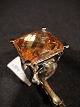 Ring with big 
colored crystal 
of 2x2 cm.
 Silver 
sterling 925.
 Ring Size: 53
