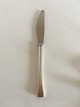 Hans Hansen 
Kristine 
Sterling Sølv 
Spisekniv. 
Designet af 
Karl Gustav 
Hansen. Måler 
22,2cm og er 
...