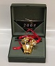 Georg Jensen 
Juleuro 2008  
Design Julerose 
Regitze 
Overgaard
Messing med 24 
karat bladguld. 
I ...