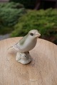 Bing & Grøndahl 
B&G Figur nr. 
1887 i 2.sort. 
B&G 
porcelænsfigurer
Irisk 
i rigtigpæn ...