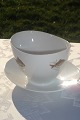 Porcelain by 
Rörstrand. 
Sauce boat on 
fixed stand. 
Fine condition.