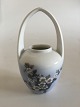 Royal 
Copenhagen Art 
Nouveau Vase 
with handle No 
1228/29. 
Measures 19cm 
and is in good 
condition.