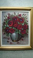 Harriet Hansen 
(1920-87):
Røde roser i 
vase på bord.
Olie på 
lærred.
Sign.: H. 
Hansen
50x40 ...