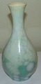 Royal 
Copenhagen 
Crystalline 
Glaze Vase by 
Paul Prochowsky 
21-12-1922. 
Measures 21,3cm 
and has a ...