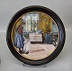 Kgl. "Køkkenet 
fra 1896 Motiv 
3. fra serien 
Familiebilleder.
 Rund Carl 
Larsson 
porcelænsplatte 
i ...