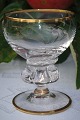 glas med 
guldkant, 
Gisselfeld 
glasservice fra 
Holmegaard 
glasværk, 
produceret fra 
1933 til 1970. 
...