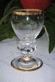 glas med 
guldkant, 
Gisselfeld 
glasservice fra 
Holmegaard 
glasværk, 
produceret fra 
1933 til 1970. 
...