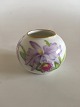 Royal 
Copenhagen Art 
Nouveau Vase in 
overglaze with 
flower motifs. 
Measures 5,5cm 
and is in good 
...