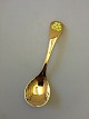 Georg Jensen 
Årsske 1985 i 
forgyldt 
Sterling Sølv. 
Måler 15 cm.