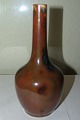 Royal 
Copenhagen Art 
Nouveau Unique 
Ludvigsen 
Crystaline 
glaze vase No 
988. Measures 
19cm and is ...