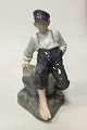 Royal 
Copenhagen 
Figurine Boy on 
Rock No. 1659. 
Designed by 
Christian 
Thomsen. 
Measures 30 cm 
/ ...