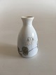 Royal 
Copenhagen Art 
Nouveau 
Miniature Vase 
No 48/1261. 
Measures 6,8cm 
and is in 
perfect 
condition.