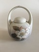 Royal 
Copenhagen Art 
Nouveau Vase 
with handle No 
53/29B. 
Measures 11,5cm 
and is in good 
condition.