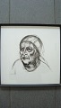 Hanne K. Smidth 
(født 1930):
Portræt af 
kvinde med 
tørklæde.
Litografi på 
papir.
Sign.: ...