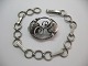 Jugend/skønvirke 
armbånd i sølv  
fremstillet af 
dansk sølvsmed 
Hugo Grün, Kbh. 
Længde ca. 20 
cm ...