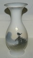 Vase porcelain 
from Royal 
Copenhagen. 
Decorated with 
bird in the 
landscape. 
Factory second 
...