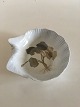 Royal 
Copenhagen Art 
Nouveau Dish 
formed as a 
shell No 4/17B. 
Measures 19cm 
and is in good 
...