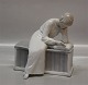 Bing and 
Grondahl Art 
Nouveau B&G 
1627 Woman on 
bench 18 cm 
Marked with the 
three Royal 
Towers ...
