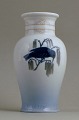 Royal 
Copenhagen, 
Paaske 1921. 
18.5 cm. høj. I 
perfekt stand, 
1.sortering.