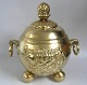 Punsch bowle in 
brass, Denmark, 
1923, hammered 
and punctured, 
on three ball 
legs. Corpus 
...