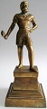 Bronzeskulptur, 
Thor med 
hammer, på 
sokkel, o. 
1900. H.: 19 
cm. 