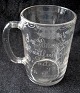 Engelsk 
maritimt ølglas 
i presset glas, 
19. årh. Med 
slebet 
dekoration og 
tekst.: In 
Memmery of ...