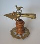 Wax pile holder 
("clampstick") 
of brass. 18th 
century.