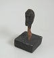 Malvin, Sven 
(1923 - ) 
Sverige: 
Ansigt. 
Udskåret træ. 
H.: 10 cm. 
Betegnet under 
...