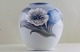 Royal 
Copenhagen vase 
with a flower 
and 
butterflies. 
Measures 20 x 
22 cm. Factory 
second, in ...