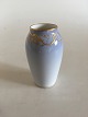 Royal 
Copenhagen Art 
Nouveau Vase 
with gold No 
144/1212/88A. 
Measures 12,5cm 
and is in 
perfect ...