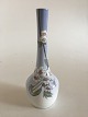 Royal 
Copenhagen Art 
Nouveau Vase No 
863/132. 
Measures 26,2cm 
and is in 
perfect 
condition.