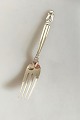 Georg Jensen 
Sterling Sølv 
Konge 
Spisegaffel No 
012. Måler 18,9 
cm. Design 
Johan Rohde.
