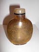 Kinesisk 
snusflaske i 
brunt glas med 
indre 
gulddekoration 
med drager - 
den indre 
dekoration er 
...