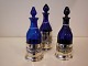 3 olie/eddike 
flasker i blåt 
glas alle med 
originale 
propper og 
sølvpletmontering 
- 2 af ...
