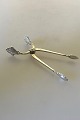 Georg Jensen 
Sterling Sølv 
Dronning Sukker 
Tang No 174. 
Måler 10 cm