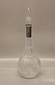 Decanter with 
silver mounting 
on the neck 830 
S 39 cm 
including 
stopper