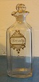 Old antique 
decanter for 
brandy (Cognac) 
from the middle 
of the 19th. 
century. Text 
in gold on ...