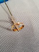 Ring med 
brillanter.
Rød og hvid 
guld 14k 585 
Brillanter 7 
stk. 0,18 carat 
...