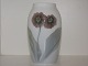 Royal 
Copenhagen 
small Art 
Nouveau vase 
with primrose. 
The factory 
mark tells, 
that this was 
...