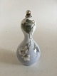 Royal 
Copenhagen Art 
Nouveau Silver 
mounted Gourd 
shapped vase No 
43/121. 
Measures 
19,5cm.
