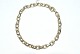 Ankerkæde 
armbånd Guld, 
14 Karat
Stemplet:  585
Længde 25 cm. 
Bredde 7,5 mm
Tråd ...