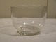 Mælkekop i 
klart glas 
Holmegaard
på lav ring 
fod
H.6,5cm. 
Ø.8,4cm.