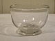 Mælkekop i 
klart glas 
Holmegaard
på lav ringfod
H.6,5cm. 
Ø.8,3cm.