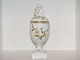 Royal 
Copenhagen 
Lidded jar with 
boy figurine 
decorated with 
daisies.
The factory 
mark shows, ...