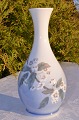 Vase with 
floral motif. 
Royal 
Copenhagen 
porcelain. RC. 
Vase no. 
863-51. Height 
22 cm. 2. ...