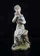 Spansk figur i 
porcelæn med 
motiv af 
stående kvinde 
med hund
Design af 
Nadal
Porcelæn, ...