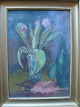 Ruben Gelardi 
(1938-2012):
Opstilling med 
flaske og 
tulipaner i 
vase.
Pastel på 
papir.
Sign.: ...