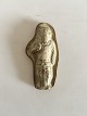 Royal 
Copenhagen 
Stentøjs Relief 
Figur af mand 
med kniv. Måler 
9cm.