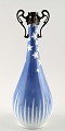 Royal 
Copenhagen Art 
Nouveau vase 
med montering.
Måler 25 cm. 
1. sortering, 
i perfekt 
stand.