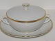 Bing & Grondahl 
Hostrup, rarely 
seen lidded 
soup cup with 
saucers.
The factory 
mark tell that 
...